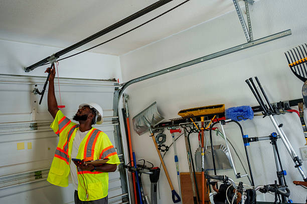 Professional Garage Door Roller Replacement technician working in Livonia, MI